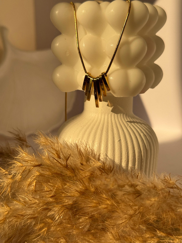 Golden Hand Charm